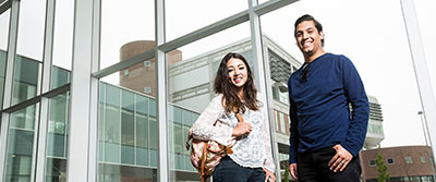 successful students in front of window