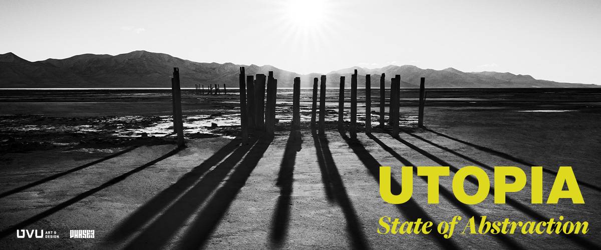 Black and white image of a desert landscape with wooden posts casting long shadows. Text reads "UTOPIA State of Abstraction."              