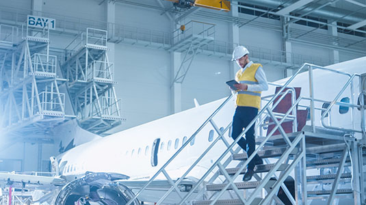 man exiting a plane