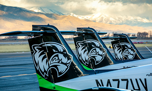 the tails of UVUs student airplanes