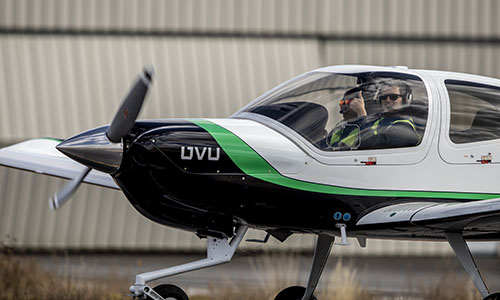 students in a cockpit ready for takeoff