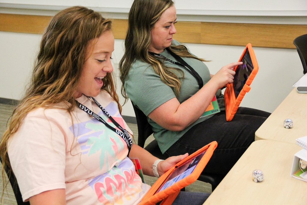 Teachers being trained on new technology.