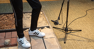 person using a sound design station