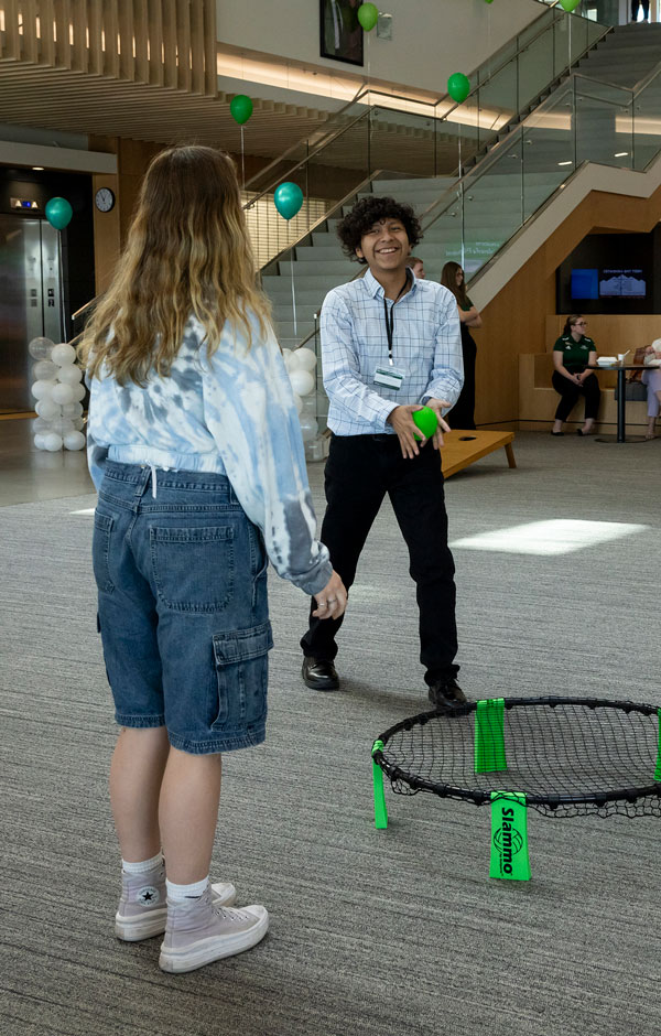 UVU 学生s participating in a club activity - spike ball