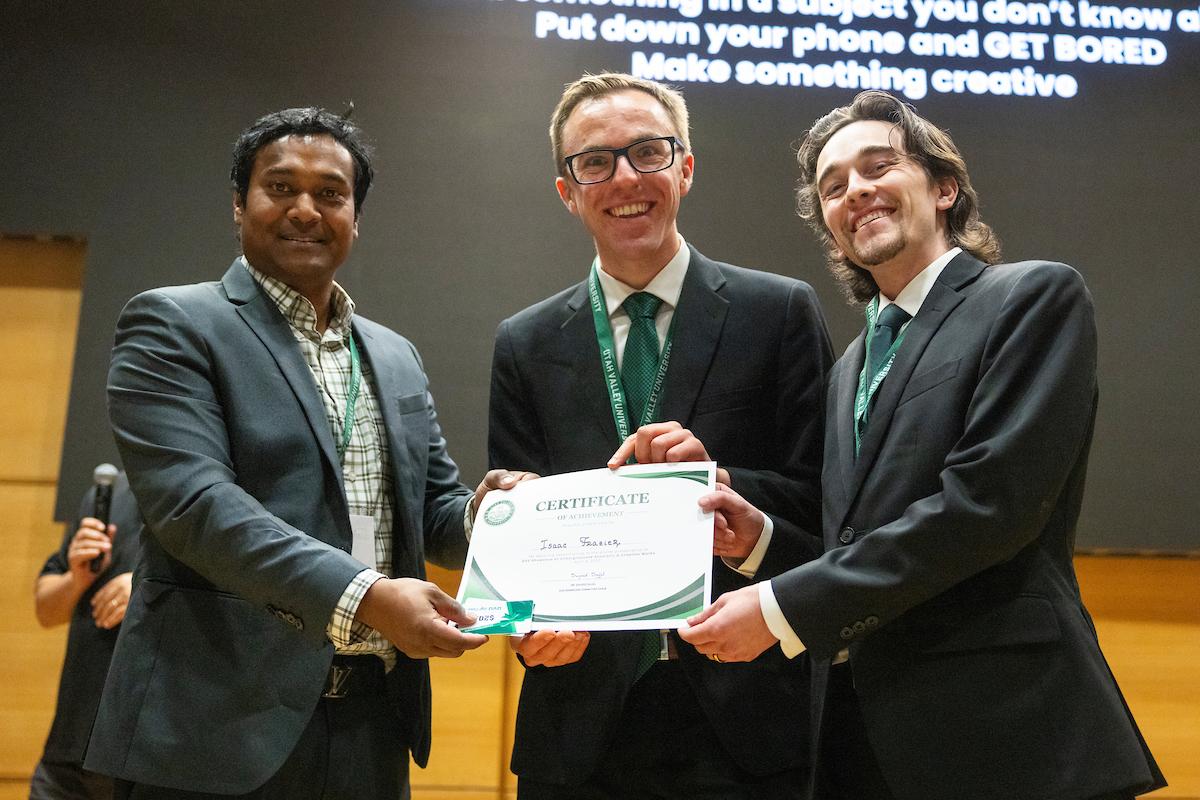 UVU professor 细哔叽Sajal posing with award recipient