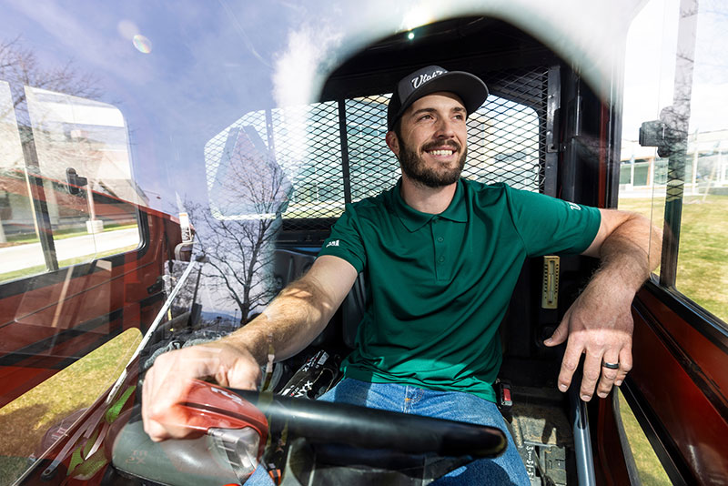 man driving a construction vehicle