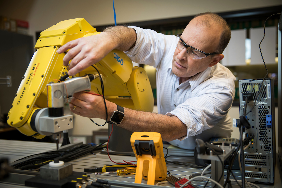 professor operating machinery