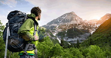 hiker looking at mountain