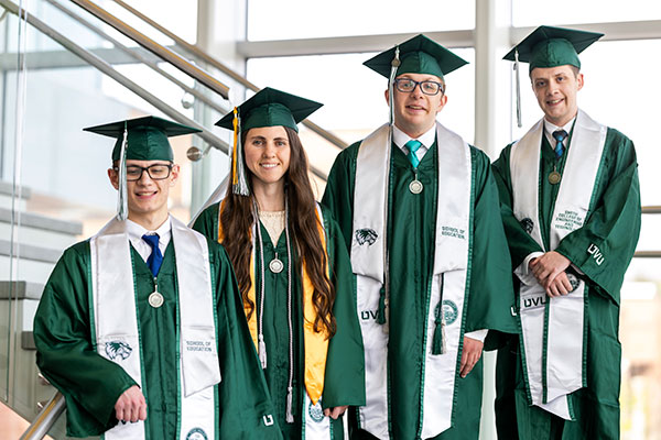 Portrait of 4 MNCA Grad 学生s